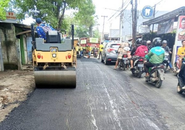 Pemkot Tangerang Aspal Jalan Menuju TPA Rawa Kucing